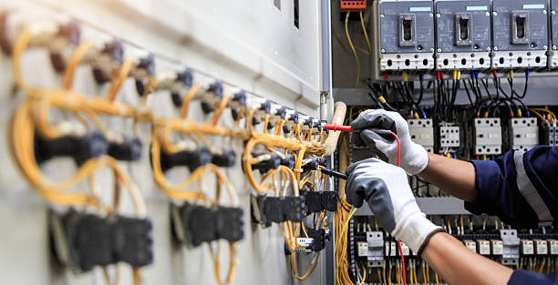 Professional Electrical Panel Upgrade technician working in Brazos County County, TX